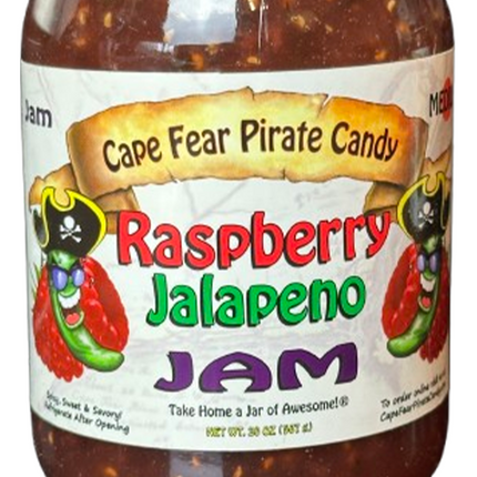 A jar of Cape Fear Pirate Candy Raspberry Jalapeno Jam, featuring a white label with pirate-themed illustrations and colorful text.